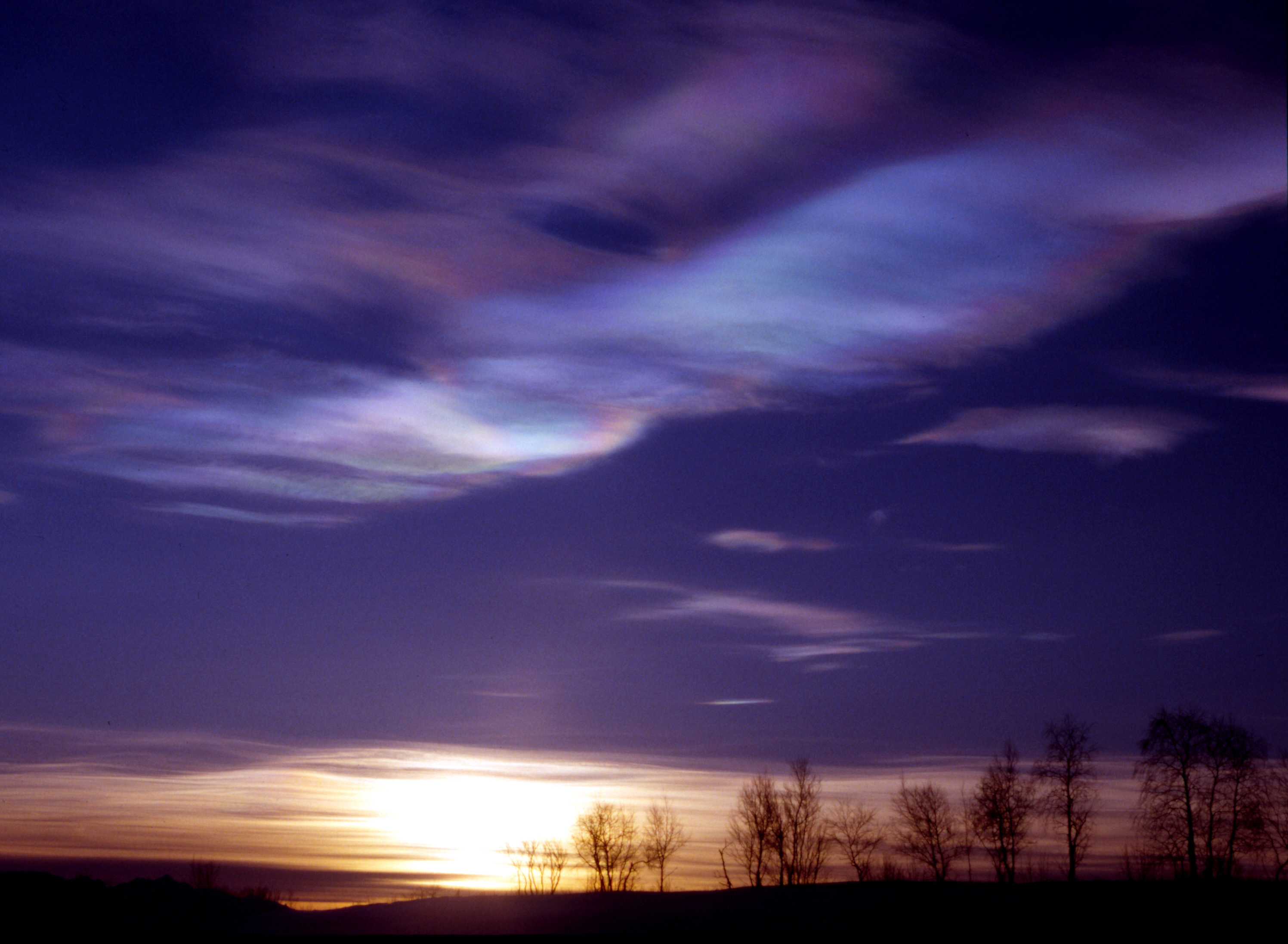 Stratospheric clouds above the Arctic, like those seen here over Kiruna, Sweden, provide ideal conditions for chemical reactions that transform chlorine to a form that depletes the Earth’s protective ozone layer. New research shows that unless greenhouse gas emissions are reduced, climate patterns that favor the formation of such clouds will continue to accelerate ozone loss. (Photo Credit: Ross Salawitch/UMD)