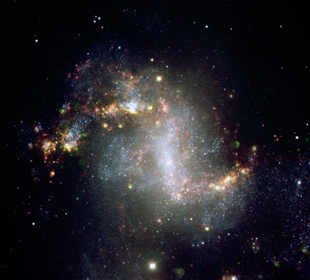 This image, taken with the European Southern Observatory’s Very Large Telescope, shows the central region of galaxy NGC1313. This galaxy is home to the ultraluminous X-ray source NCG1313X-1, which astronomers have now determined to be an intermediate-mass black hole candidate. NGC1313 is 50,000 light-years across and lies about 14 million light-years from the Milky Way in the southern constellation Reticulum. Image credit: ESO (Click image to download hi-res version.)