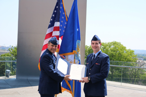 CJ Vernon, right, receives his commission as a 2nd Lt. in the U.S. Air Force. Photo courtesy of same (Click image to download hi-res version.)