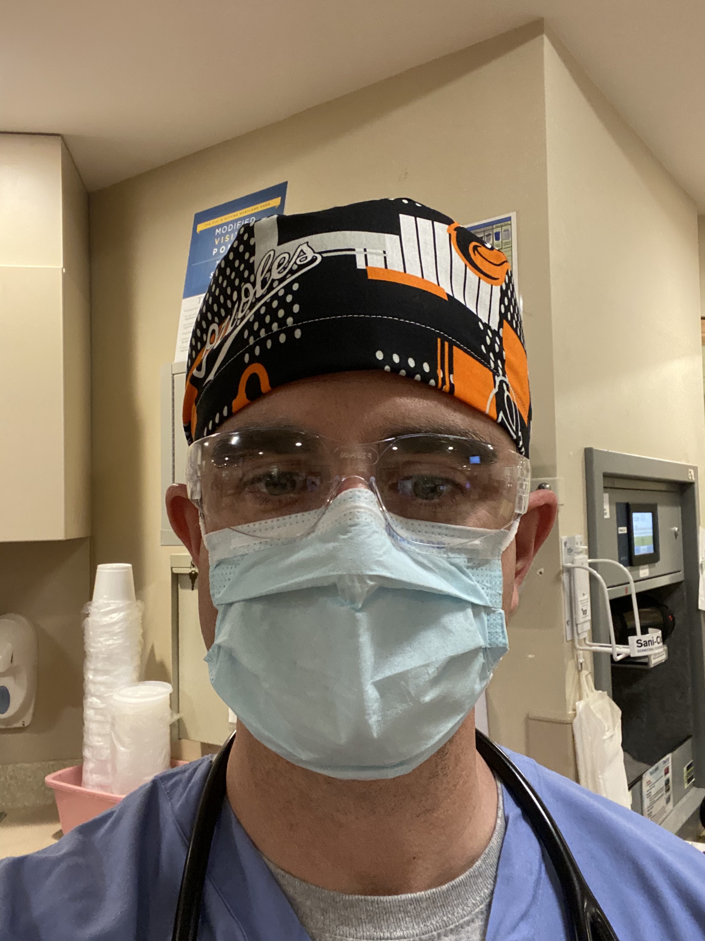 Dr. Larry Edelman (B.S. '01, biochemistry) wearing protective gear before a shift in the ER during the coronavirus pandemic. Photo courtesy of same. Click image to download hi-res version.
