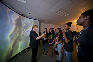 Jandelyn Plane, a senior lecturer in computer science at UMD and director of the Maryland Center for Women in Computing, speaks to  Computer Science Connect program participants in the Augmentarium.  Credit: John T. Consoli (Click image to download hi-res version.)