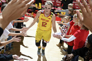 Kristen Confroy greets basketball fans before a game. Photo: Greg Fiume, University of Maryland (Click image to download hi-res version.)