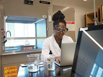 A student works in one of the new chemistry teaching labs in the Edward St. John Learning and Teaching Center. Image credit: Faye Levine / University of Maryland (Click image to download hi-res version.)