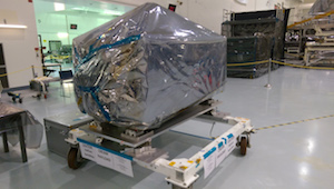 The ISS-CREAM payload was delivered to NASA's Kennedy Space Center in August 2015. The experiment is shown wrapped in plastic layers used to protect its sensitive electronics during shipment.  Image credit: University of Maryland Cosmic Ray Physics Laboratory (Click image to download hi-res version.)