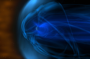 A giant magnetic field (swirling blue lines) surrounds Earth. As Earth travels through solar wind (orange area), its magnetic field creates a bow shock in front of itself (pale blue area). Image: NASA/Goddard Space Flight Center (Click image to download hi-res version.)