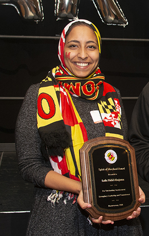 Laila Abujuma winning the Spirit of Maryland award. Photo: Thai Nguyen, University of Maryland (Click image to download hi-res version.)