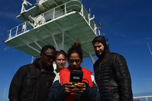 ESSIC's Santiago Gassó (second from left) teaches graduate students how to make atmospheric measurements on board the German research icebreaker Polarstern. Image credit: X. Vega (UMAG) (Click image to download hi-res version.)