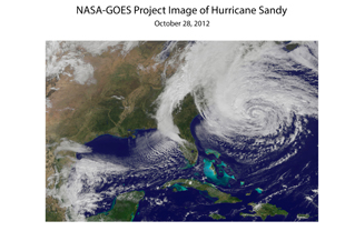 This satellite image shows Hurricane Sandy on October 28, 2012, shortly before it made landfall and was renamed a superstorm. Image credit: NASA-GOES (click image to download hi-res version.)
