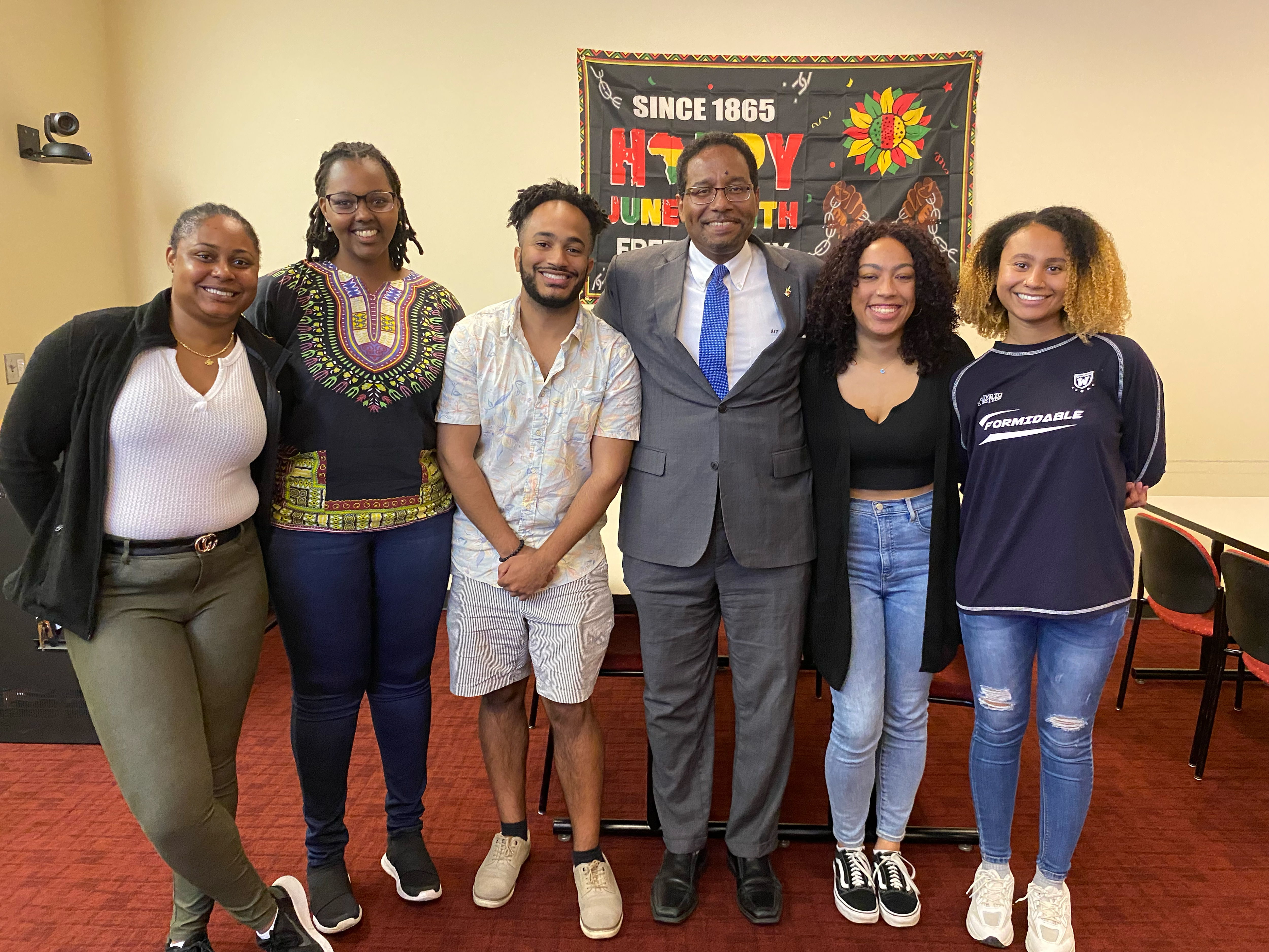 Black Scholars in Biology student organization poses with University of Maryland President Darryll Pines on Juneteenth 2023.