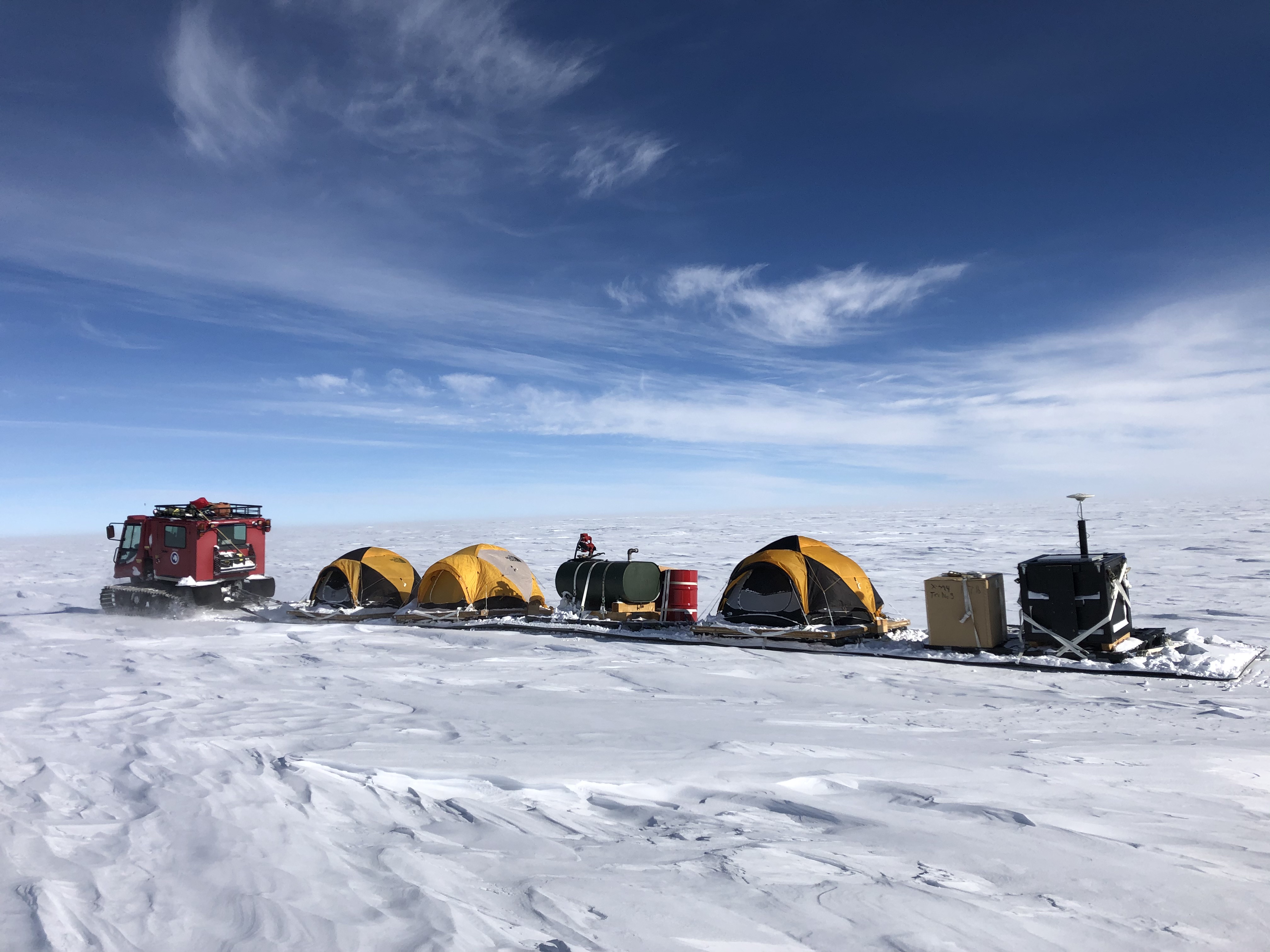  UMD researcher Kelly Brunt traversed the Antarctic taking measurements to verify satellite-based elevation data. For weeks at a time, the four-person crew lived in tents and towed everything they needed for survival on sleds through the frozen landscape. Photo Courtesy: Kelly Brunt.