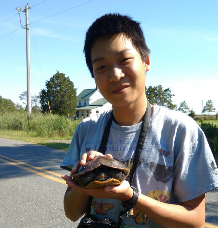 Forever a Terp, Justin Lee holds a diamondback terrapin during one of his wildlife photography excursions. Image Credit: Aleta Quinn (Click image to download hi-res version.)